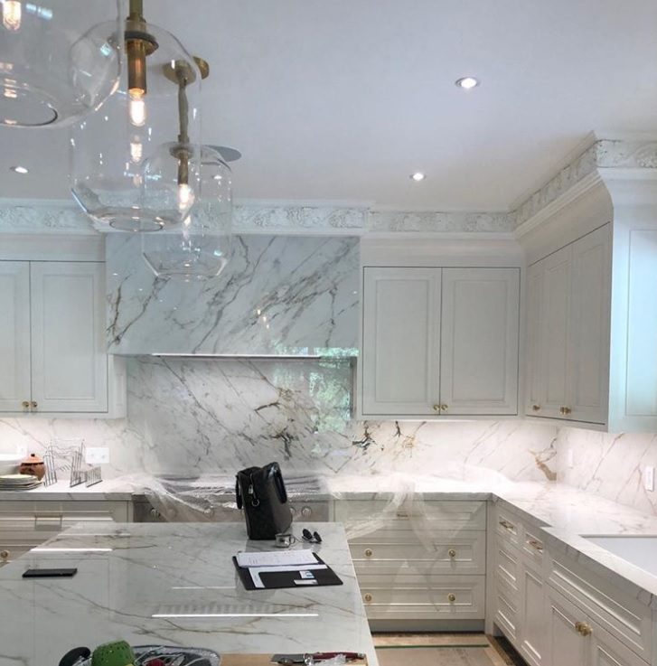Classic marble kitchen with glass pendant lighting