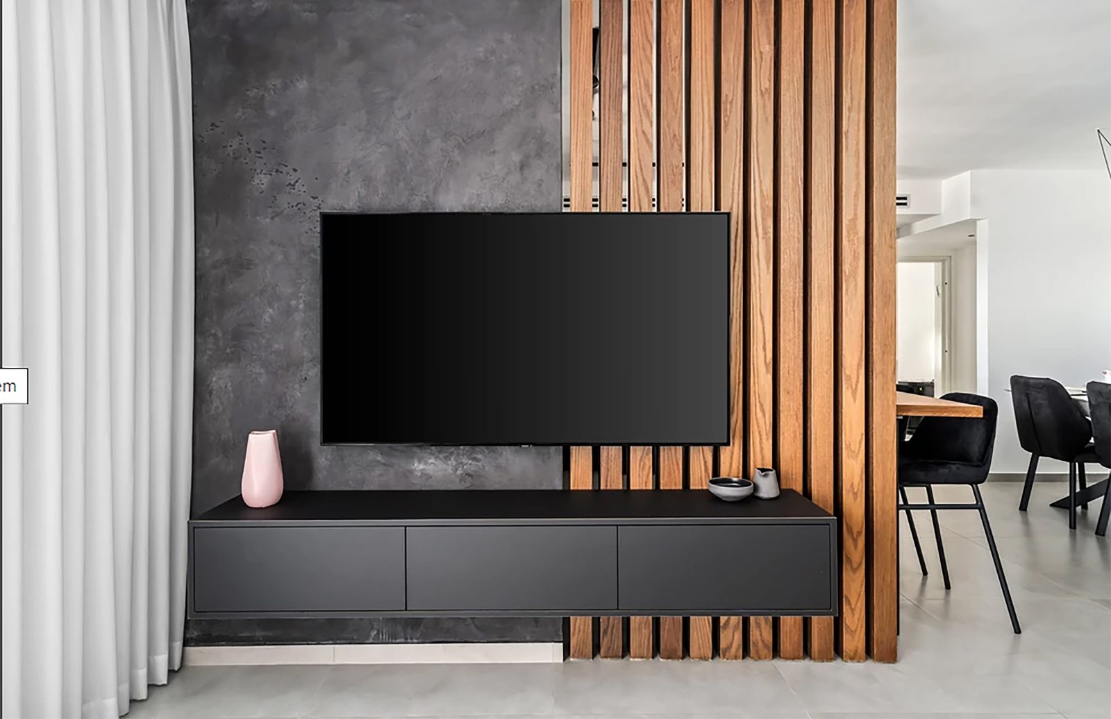 Slat-wood media wall in a modern interior