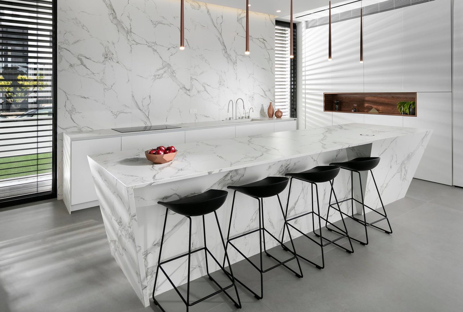 Marble kitchen island with bar seating