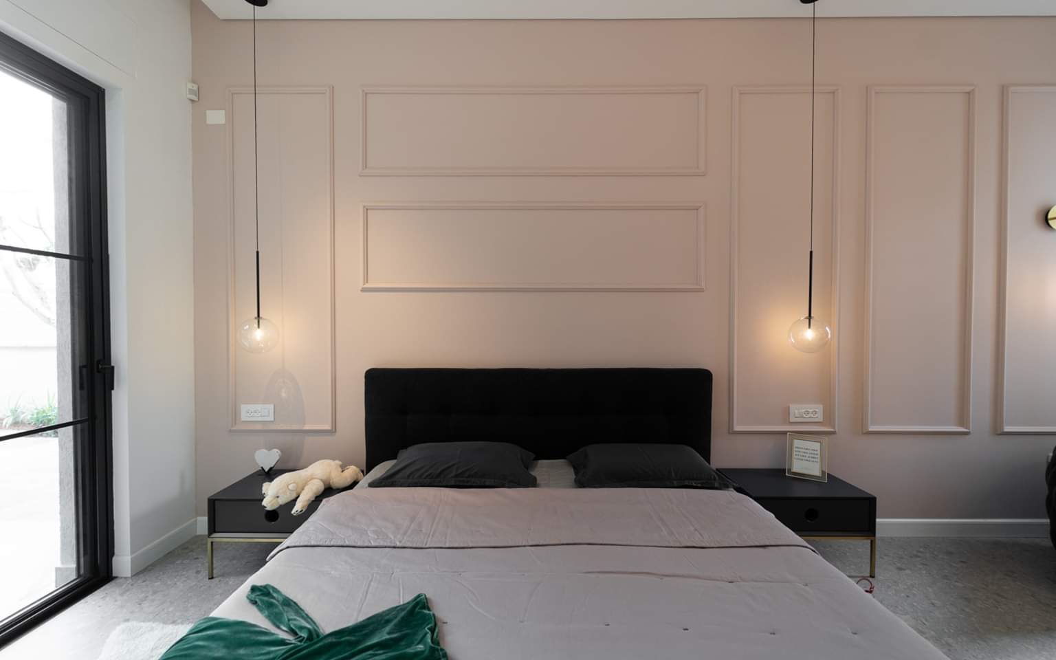 Bedroom with built-in wardrobes in a custom villa